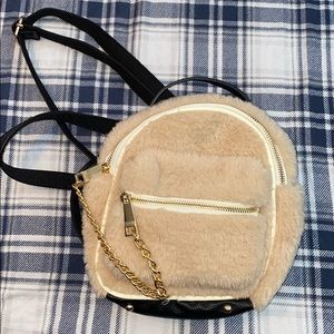 Nudie Patootie fuzzy mini backpack
